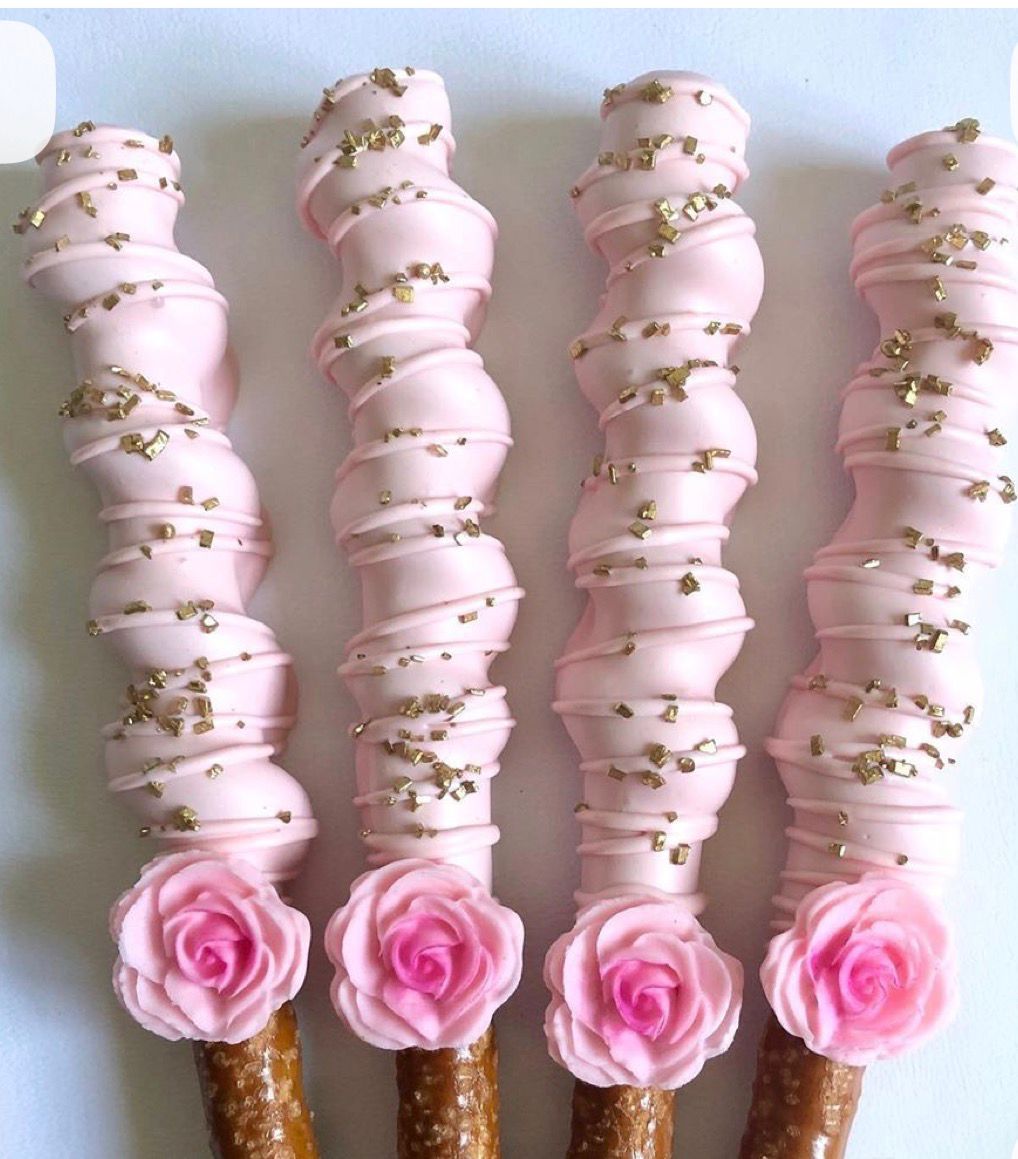 Pink chocolate pretzel rods with roses