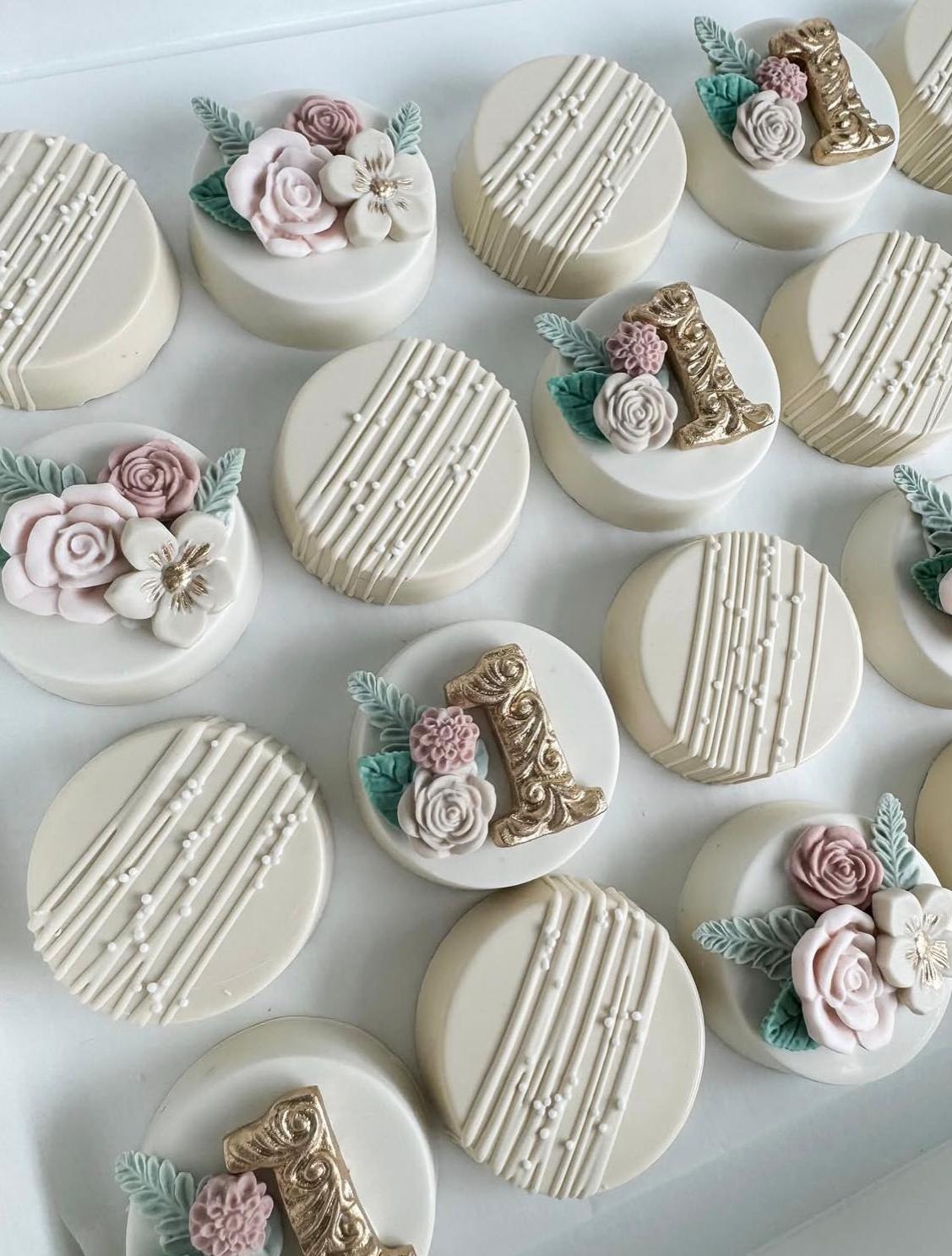 Chocolate covered oreos with floral decorations